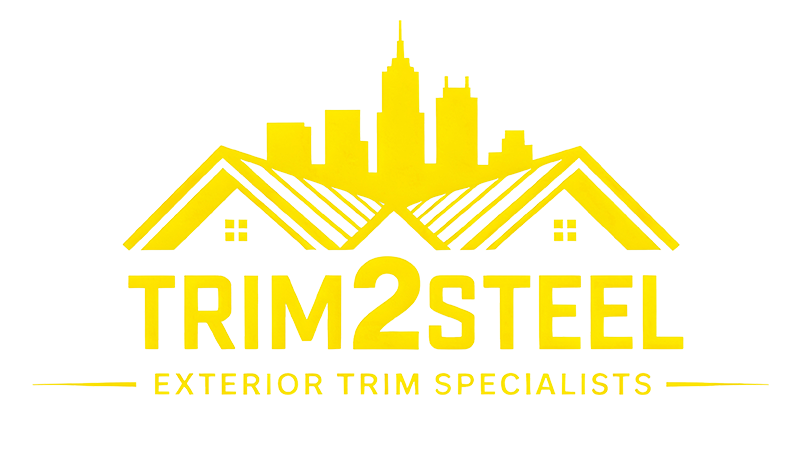  Logo for “Trim2Steel” featuring stylized yellow rooftops and a city skyline in the background. Bold uppercase text “TRIM2STEEL” is centered below the graphic, with “EXTERIOR TRIM SPECIALISTS” in smaller uppercase letters underneath. The entire design uses a bright yellow color scheme, emphasizing construction and exterior trim services.